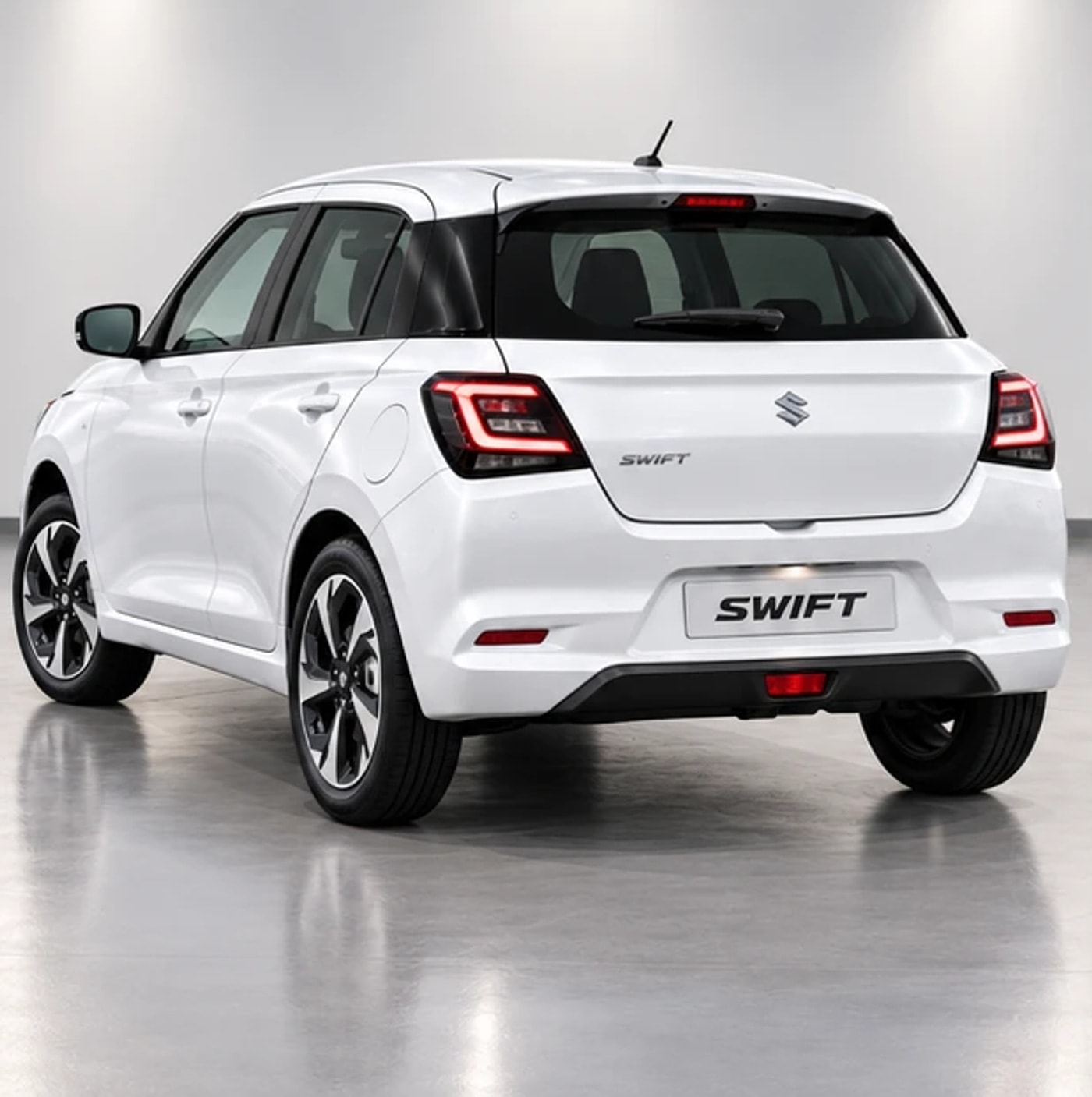 Suzuki Swift Blanche 2026 — vue trois-quarts arrière